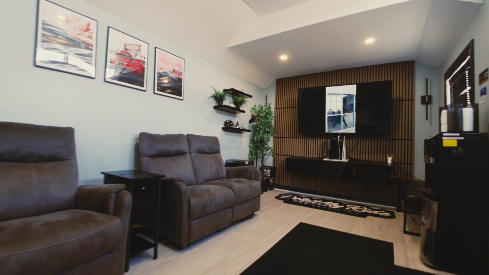 Detail My Ride customer lounge with recliners and TV